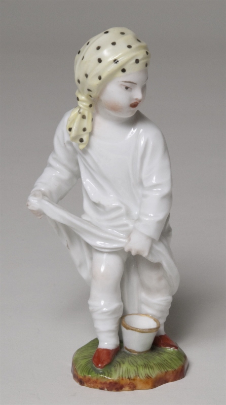 Figurin "Den ogenerade kinesflickan"