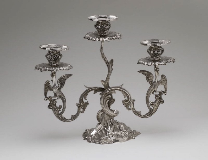 Candelabra with three arms in the shape of plants and birds
