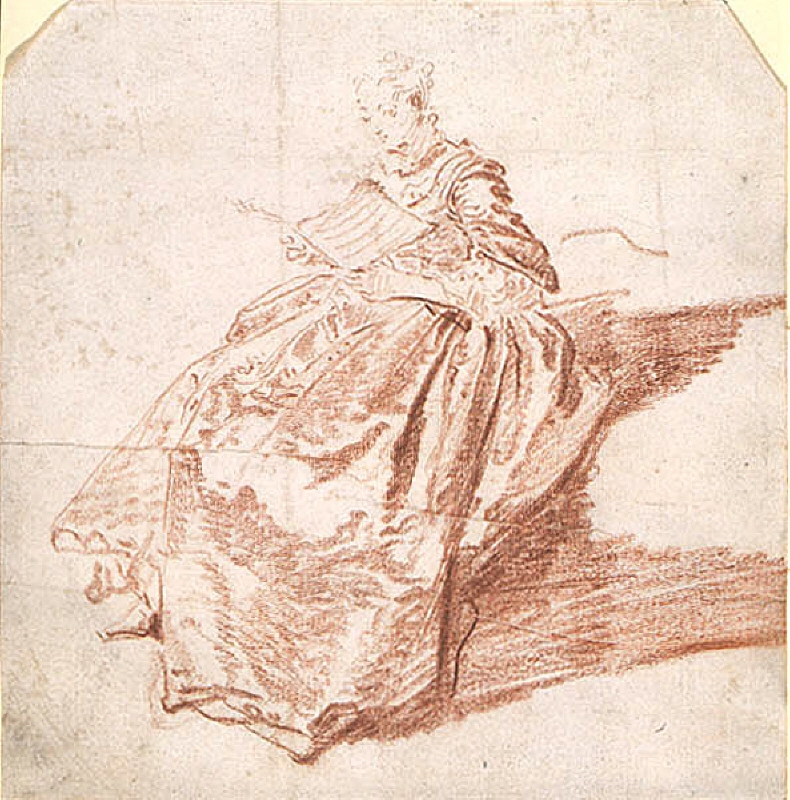 Ung kvinna sittande med ett nothäfte i handen