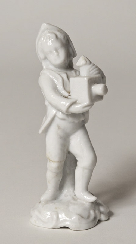 Figurin,  gosse i 1700-talsdräkt hållande en laterna magica