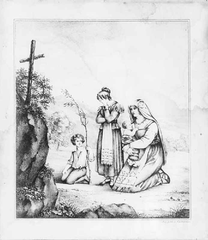 Kvinna med barn i bön framför klippkors