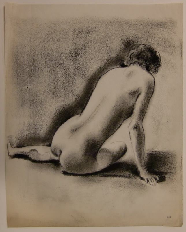 Sittande naken kvinnlig modell sedd från ryggsidan