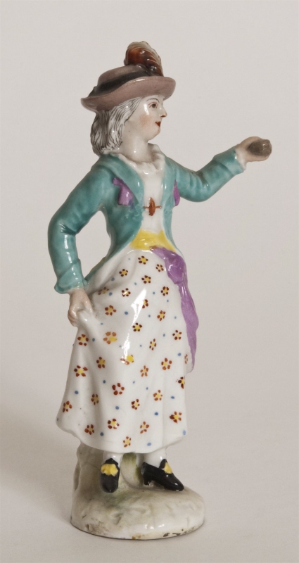Figurin, dansande flicka i hatt med plym