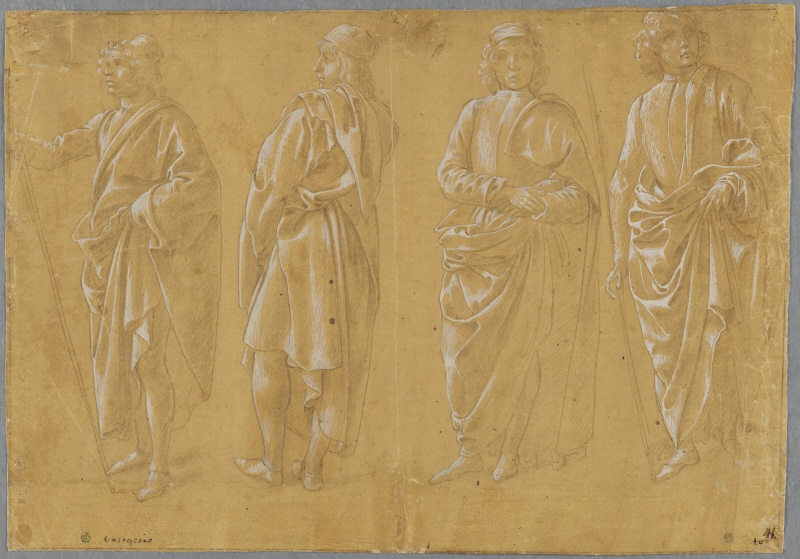Fyra stående män i mantlar