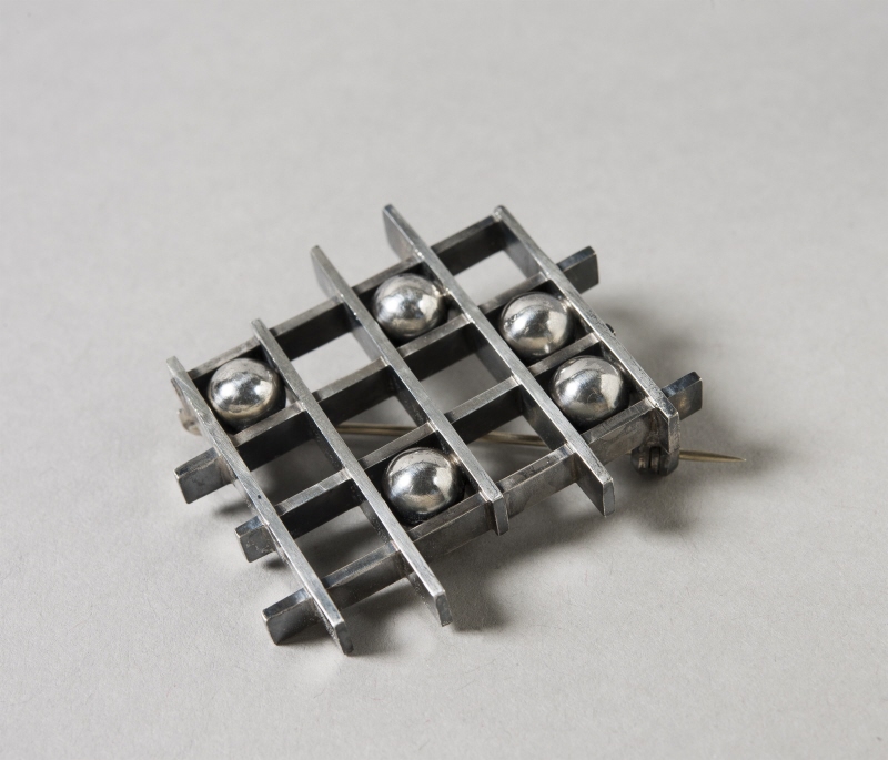 Brooch ”Noughts and Crosses”