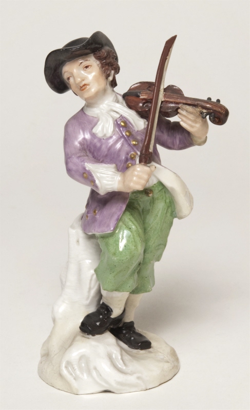 Figurin, fiolspelare med svart hatt