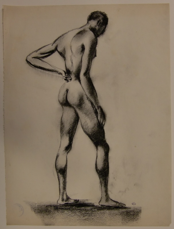 Stående manlig naken modell sedd från ryggsidan