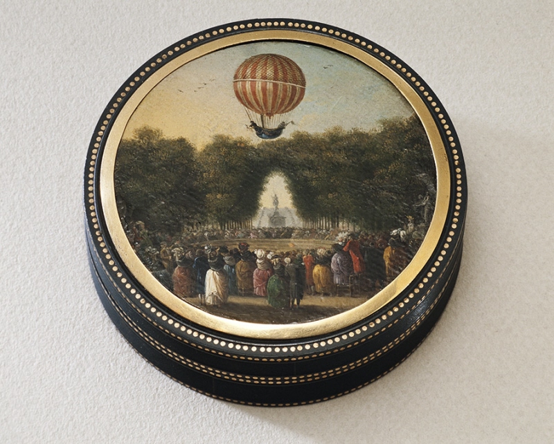 Dosa med lock, miniatyr av ballonguppstigning i Tuileriträdgården i Paris