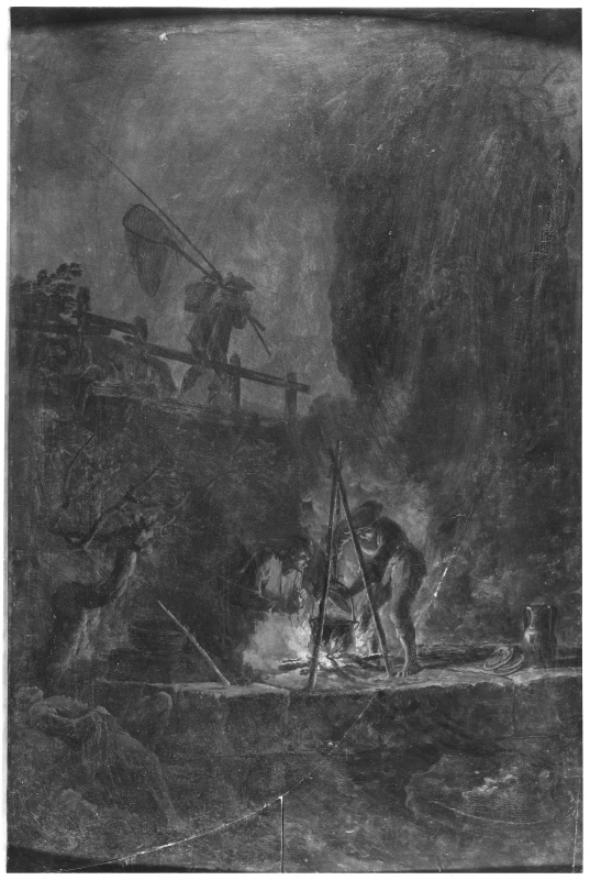 Män vid en eld i en bergsklyfta