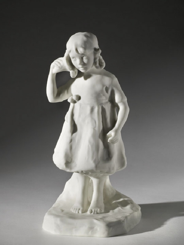 Figurin av stående flicka med snäcka