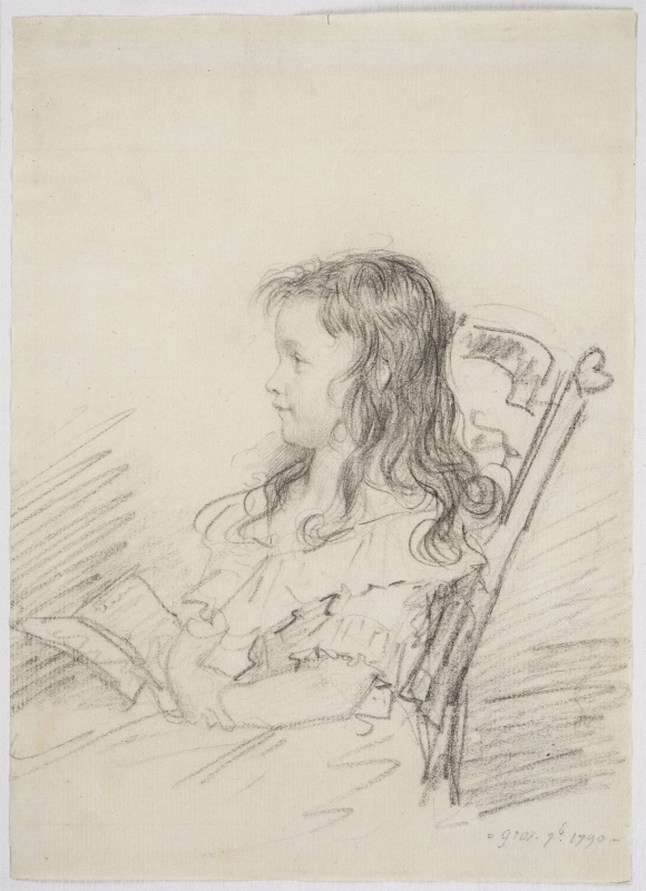 Portrait of a young girl, sitting in a chair with a book in her hand