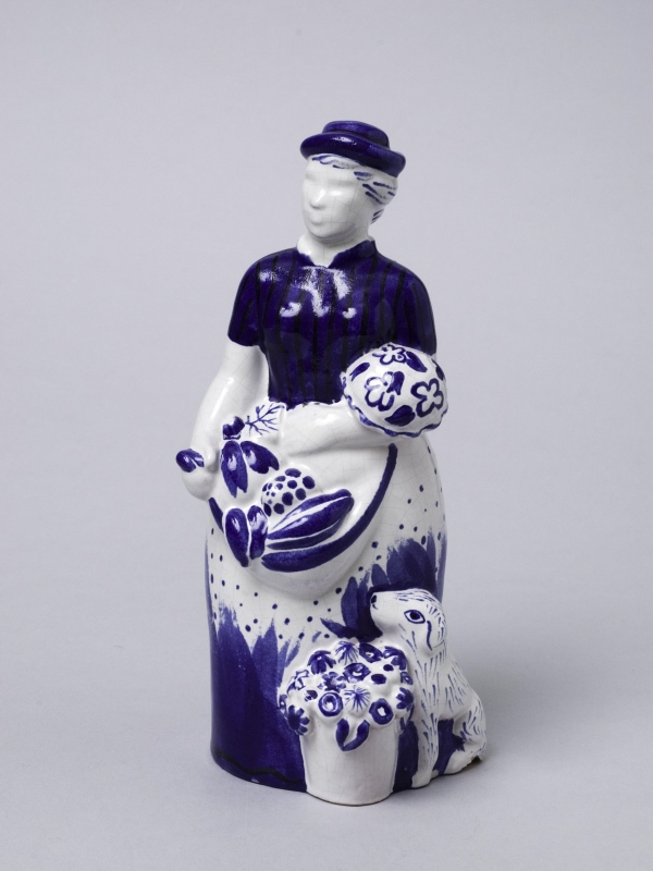 Figurin/skulptur, kvinnofigur med hund och skörd