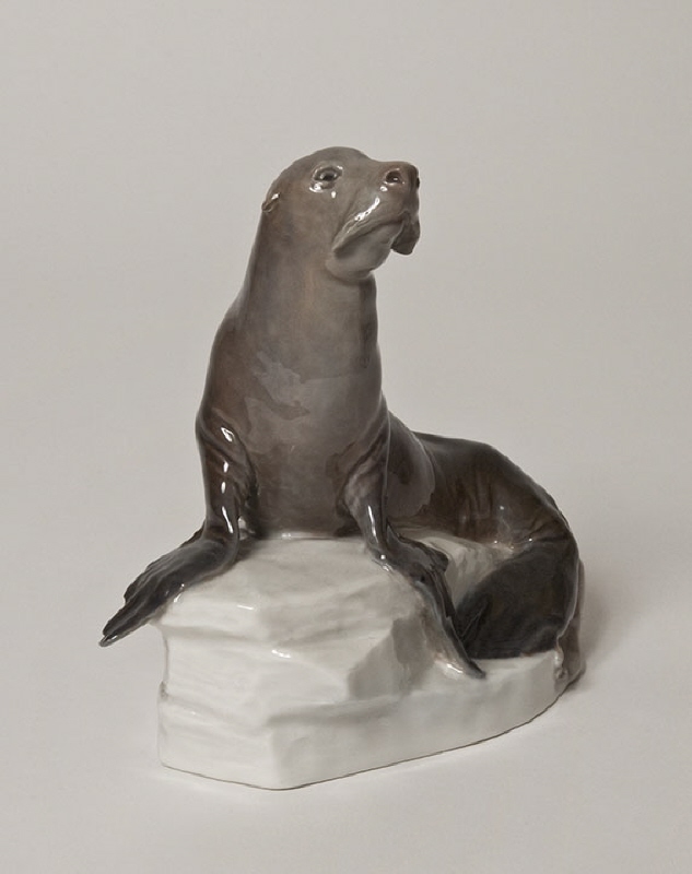 Figurin, sjölejon sittande på isblock